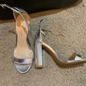 Lulus size 6 sliver heels. 4 inch heel